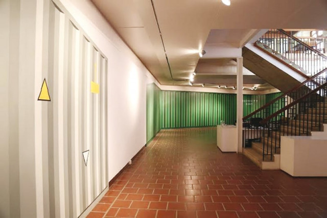 artist seher naveed has painted the walls of the ivs gallery in grey and green colours depicting them as containers photo courtesy ivs gallery artist seher naveed has painted the walls of the ivs gallery in grey and green colours depicting them as containers photo courtesy ivs gallery