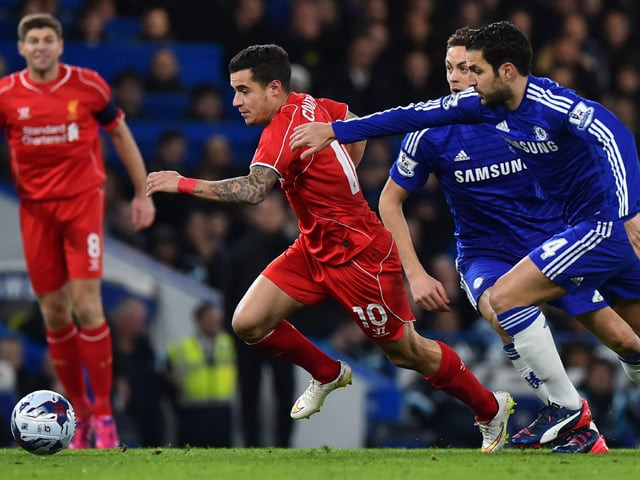 in a controversial semi final between liverpool and chelsea it was the blues that came out smiling even though the reds made life miserable for the current leaders of the premier league photo afp in a controversial semi final between liverpool and chelsea it was the blues that came out smiling even though the reds made life miserable for the current leaders of the premier league photo afp