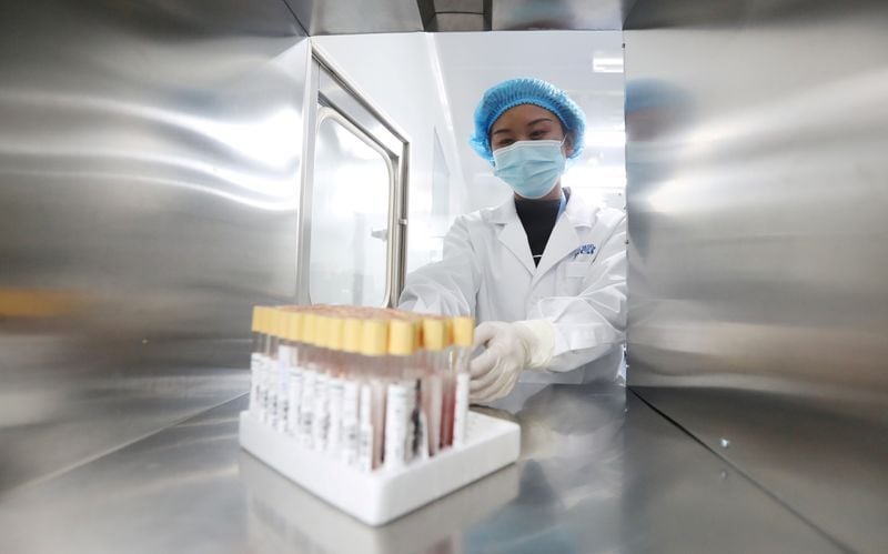 a technician works at a genetic testing laboratory of bgi formerly known as beijing genomics institute in kunming photo reuters