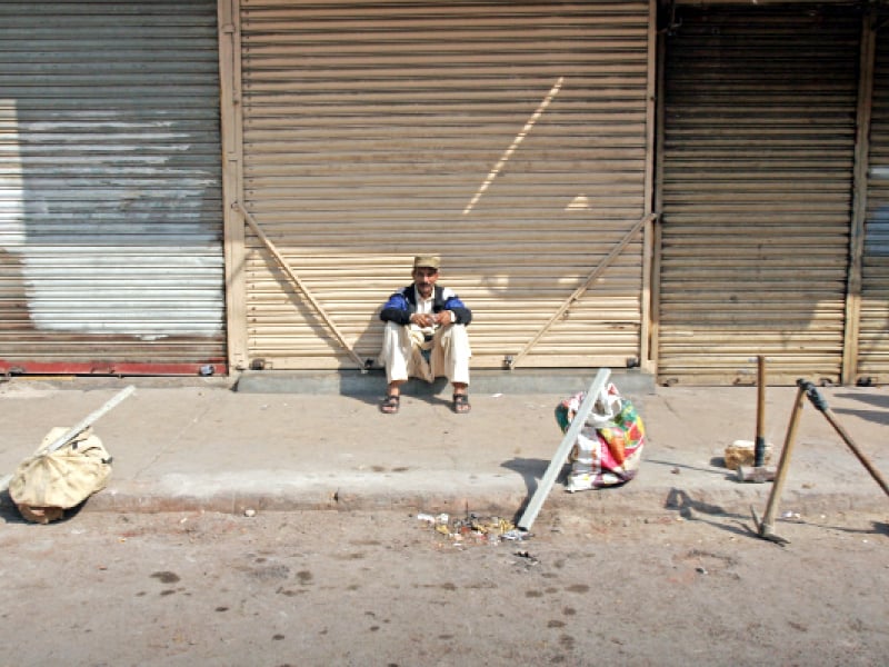 businesses remained closed across karachi as mqm observed a day of mourning across the province after the killing of its unit in charge sohail ahmed photo athar khan express