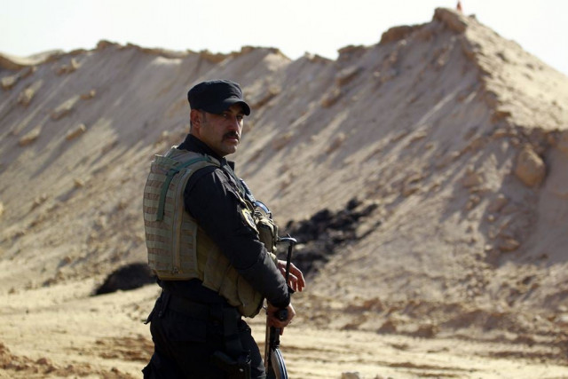 in this file photo a member of the iraqi security forces patrols the najaf governorate s border with the mostly islamic state is group controlled western province of anbar as new security measures have been taken to beef up security on the border of the saudi desert on january 24 2015 photo afp in this file photo a member of the iraqi security forces patrols the najaf governorate s border with the mostly islamic state is group controlled western province of anbar as new security measures have been taken to beef up security on the border of the saudi desert on january 24 2015 photo afp