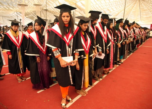 ku graduates line up to receive their degrees photo athar khan ku graduates line up to receive their degrees photo athar khan