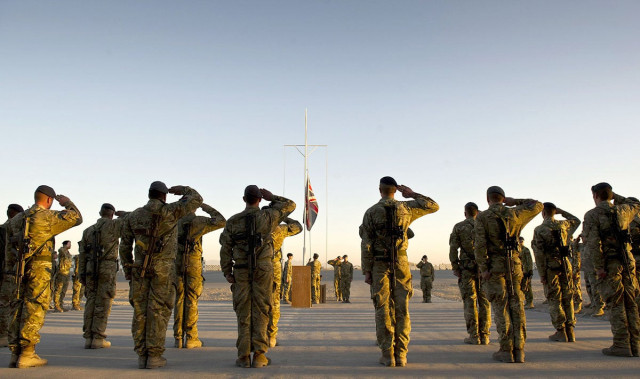 british service personnel saluting as the union flag is lowered at kandahar airfield on november 23 2014 before the last british military contingent withdrew after 13 years of fighting photo afp british service personnel saluting as the union flag is lowered at kandahar airfield on november 23 2014 before the last british military contingent withdrew after 13 years of fighting photo afp