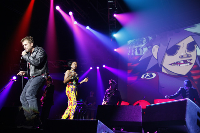british singer songwriter damon albarn performs on stage with his band gorillaz on november 22 2010 at the zenith music hall in paris photo afp british singer songwriter damon albarn performs on stage with his band gorillaz on november 22 2010 at the zenith music hall in paris photo afp