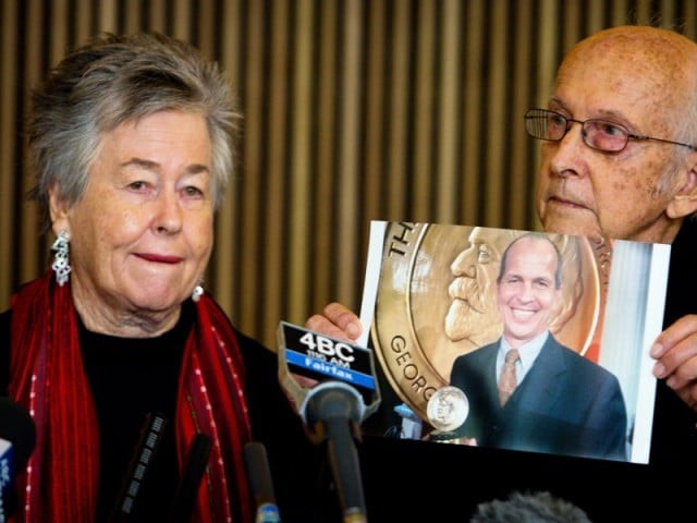 juris greste r displays a picture of his son jailed australian al jazeera journalist peter greste next to his wife lois l during a press conference in brisbane on june 24 2014 photo afp juris greste r displays a picture of his son jailed australian al jazeera journalist peter greste next to his wife lois l during a press conference in brisbane on june 24 2014 photo afp