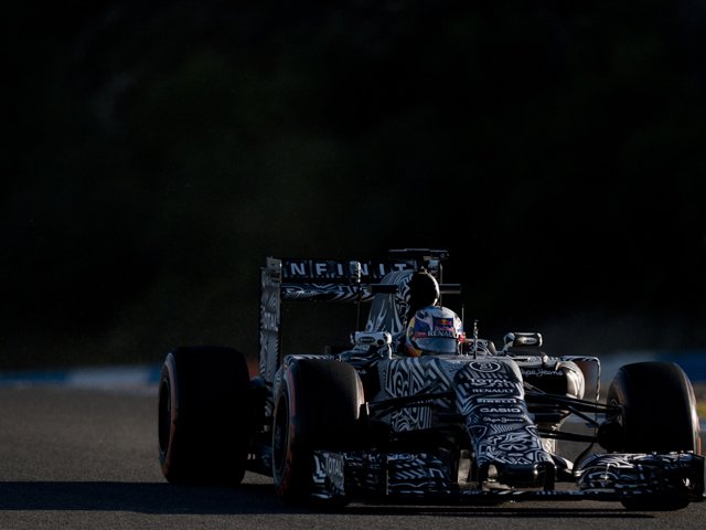 sporting an unusual camouflage livery the red bull completed more laps in the first hour on track than they managed on the first day of a disastrous first test last season photo afp
