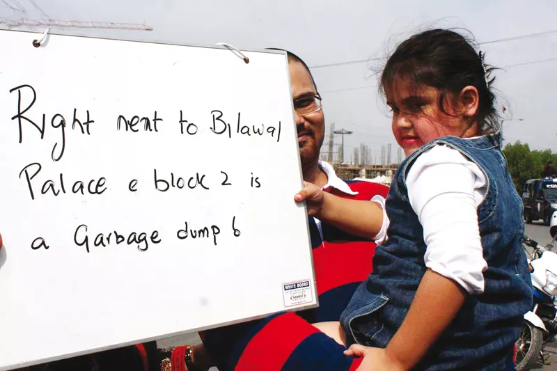 hundreds of clifton residents staged a protest against the inefficiency of civic agencies at bilawal chowrangi on sunday photo online hundreds of clifton residents staged a protest against the inefficiency of civic agencies at bilawal chowrangi on sunday photo online