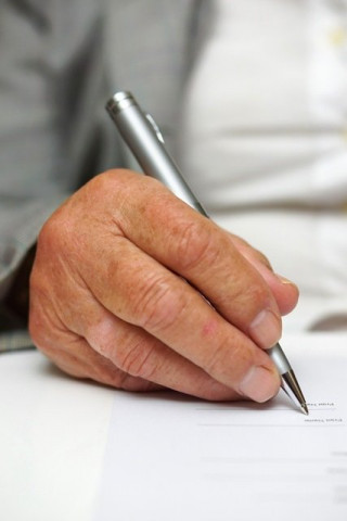 the signed joint reform bill must now go to parliament for approval stock image the signed joint reform bill must now go to parliament for approval stock image