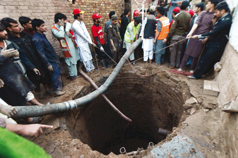 rescue workers pulls out students of the well photo muhammad iqbal express