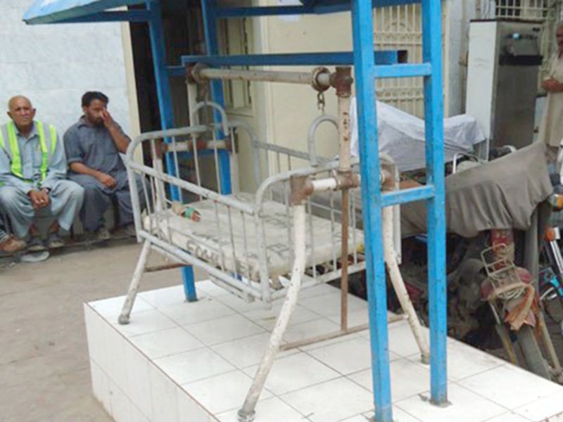 a cot outside an edhi centre where parents discreetly drop off their newborns photo file
