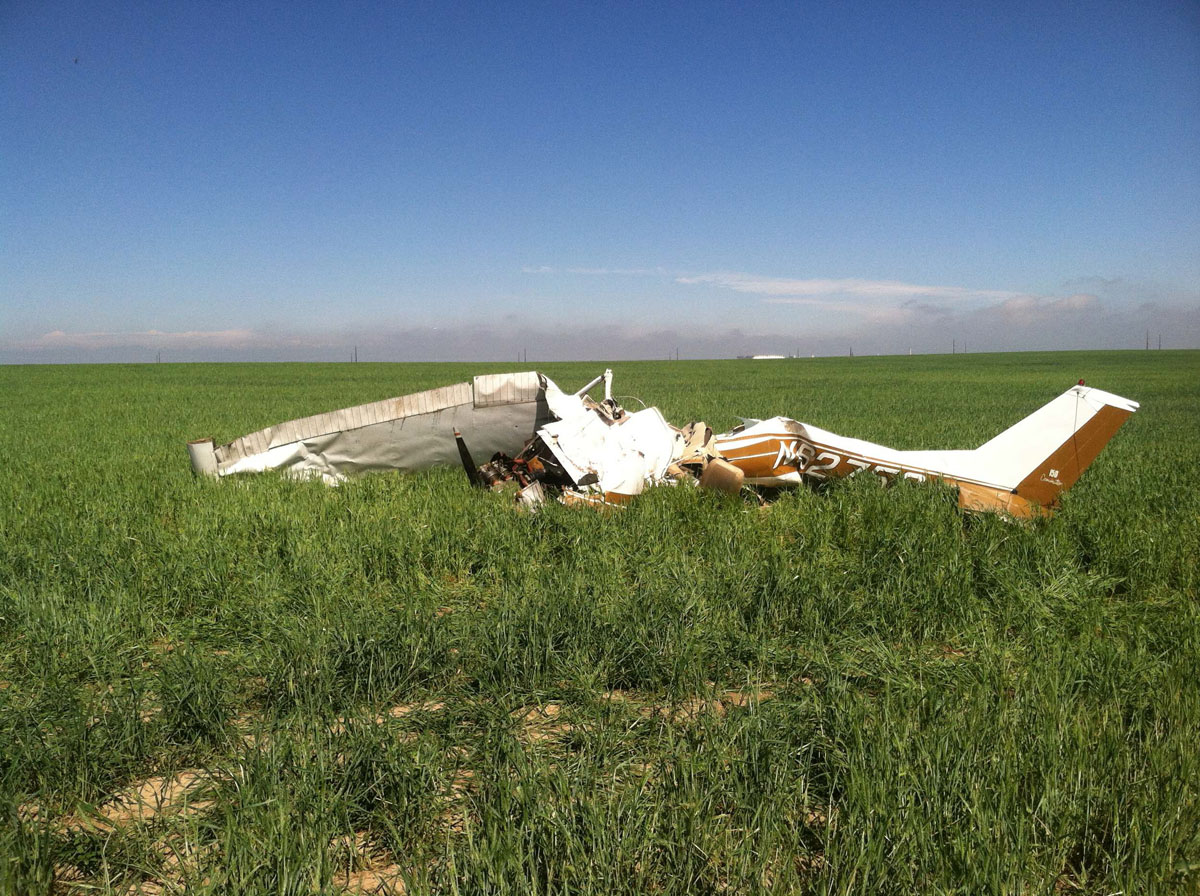 the wreckage of a crashed cessna 150 airplane lies in a field near watkins colorado on may 31 2014 photo reuters