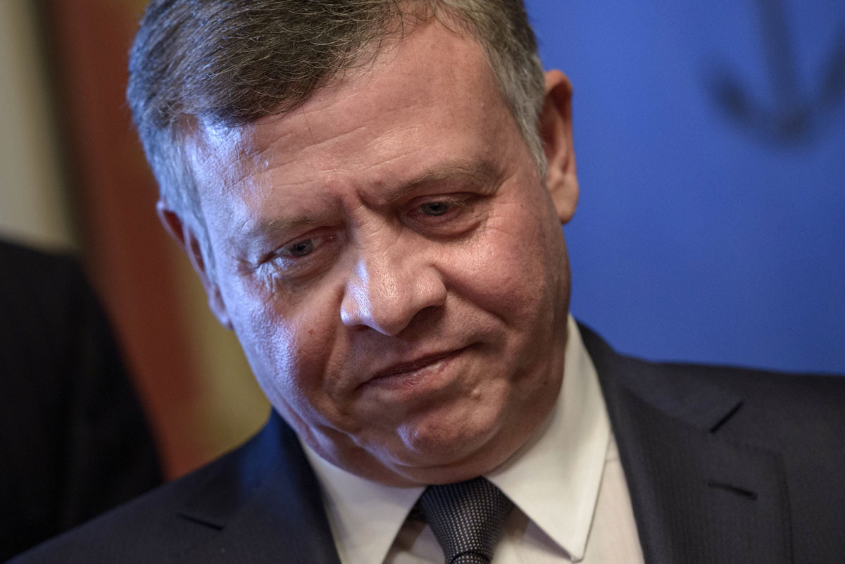 jordan s king abdullah ii vowed an quot earth shattering response quot as he cut short a visit to washington to fly home photo afp