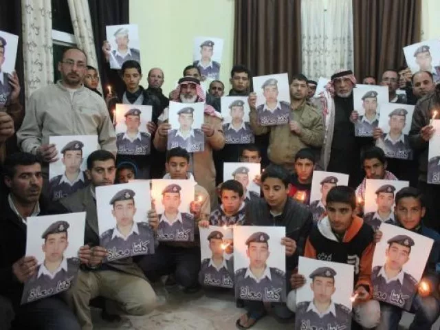 relatives of islamic state captive jordanian pilot muath al kasaesbeh hold his portrait as they take part in a rally in his support at the family 039 s headquarters in the city of karak photo reuters relatives of islamic state captive jordanian pilot muath al kasaesbeh hold his portrait as they take part in a rally in his support at the family 039 s headquarters in the city of karak photo reuters