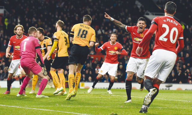 juan mata marcos rojo and james wilson fired the ball into the back of the net to award manchester united a comfortable win over cambridge united in the fa cup fourth round photo afp