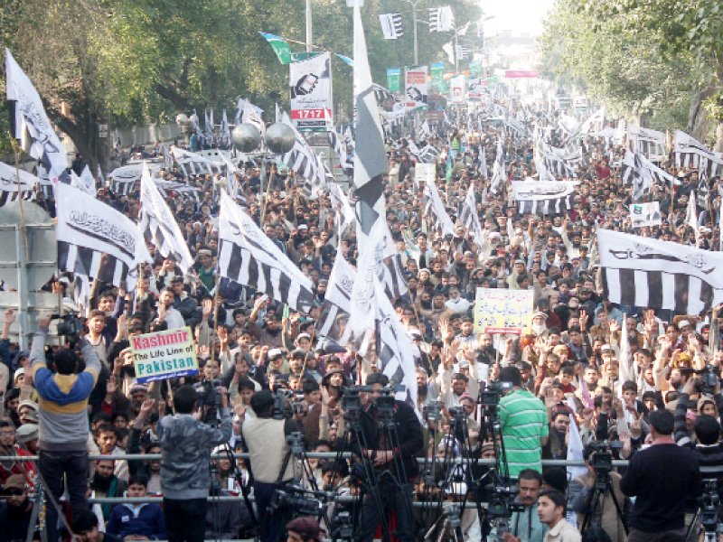 thousands of jud members held flags and banners demanding solution to the kashmir issue photo abid nawaz express