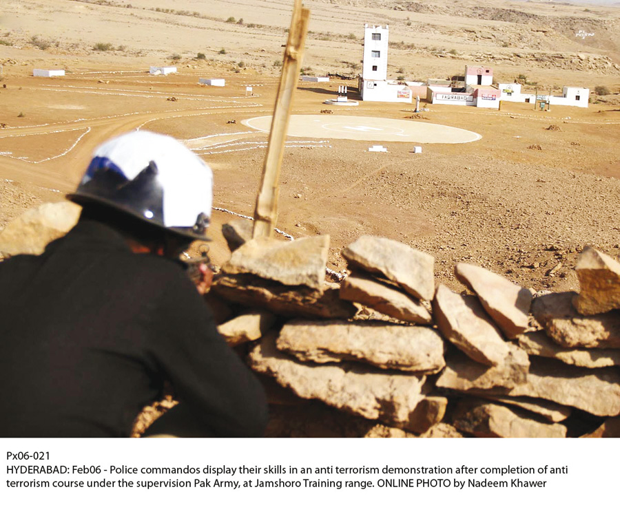 police commandoes display their skills at a demonstration after completing an anti terrorism course under the supervision of the armed forces at jamshoro training range photo online