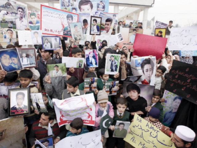 families of aps martyrs at aman chowk photo inp
