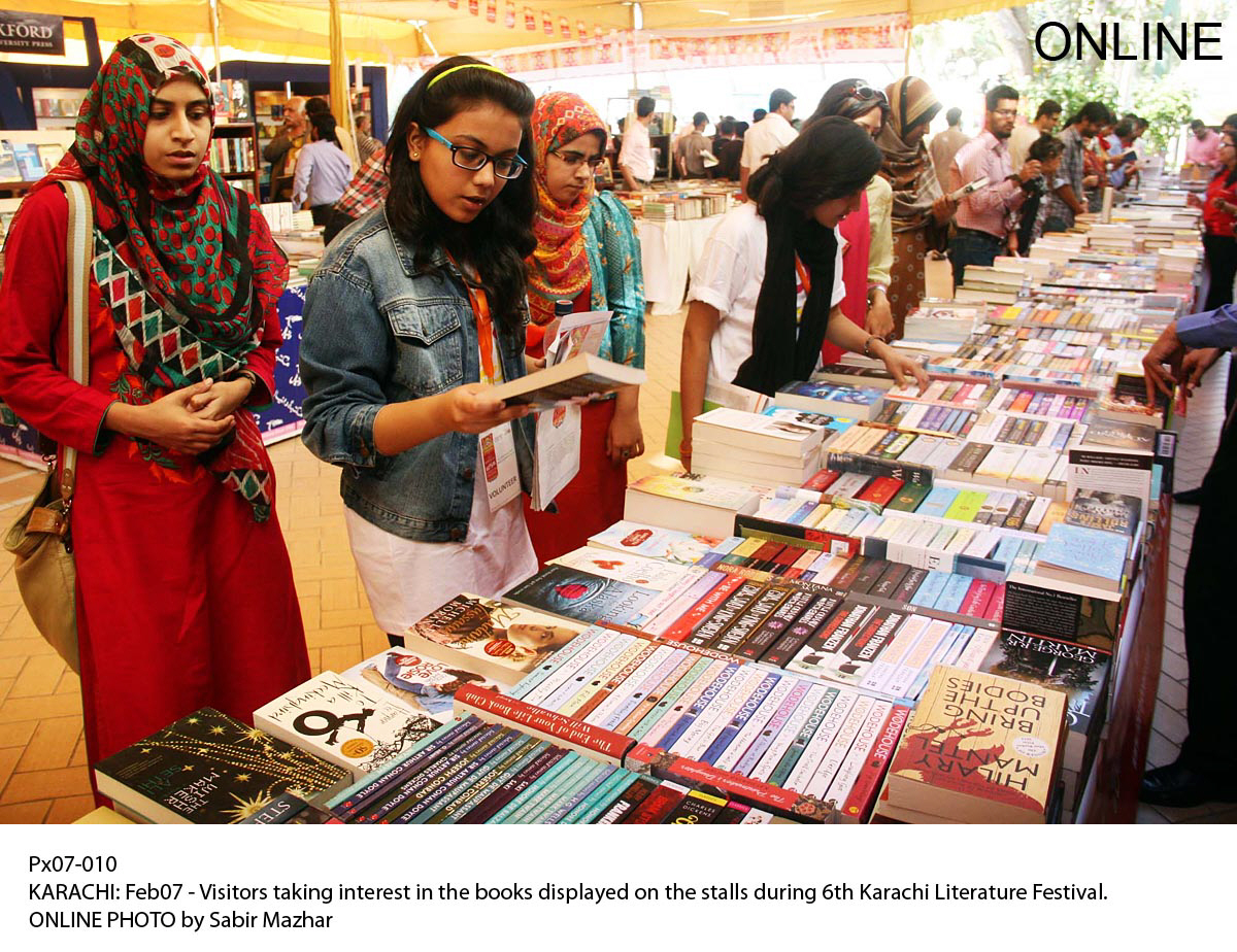 visitors taking interest in the books displayed on the stalls during the 6th karachi literature festival photo online