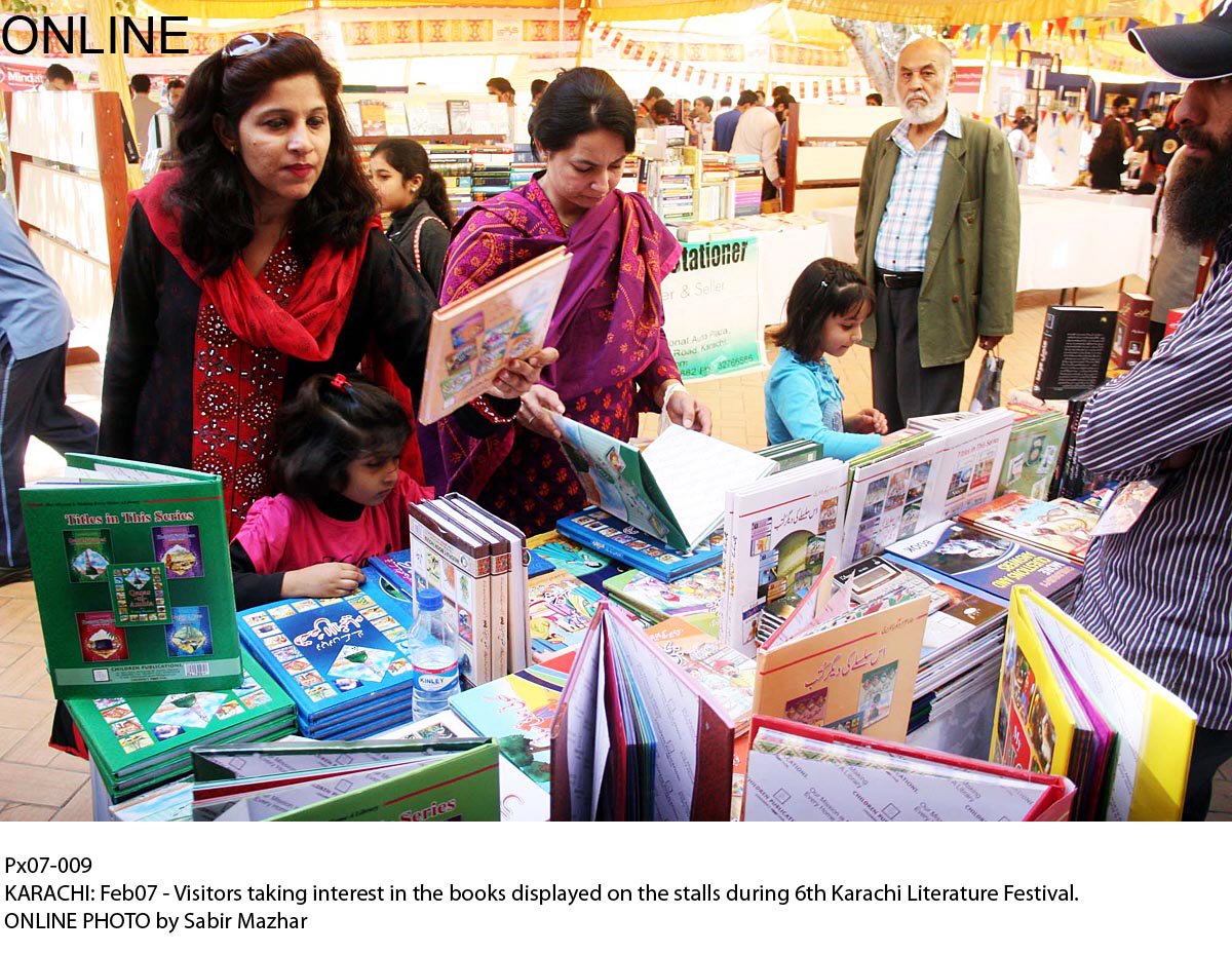 visitors taking interest in the books displayed on the stalls during the 6th karachi literature festival photo online