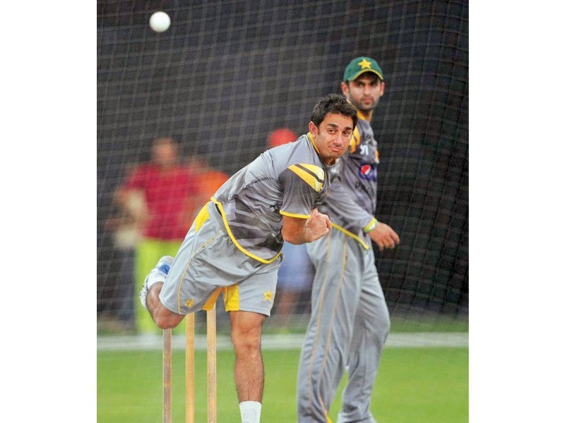 pakistan off spinner saeed ajmal has been cleared by the icc for his bowling action but has ruled out his involvement in the world cup except for in an extraordinary situation photo afp