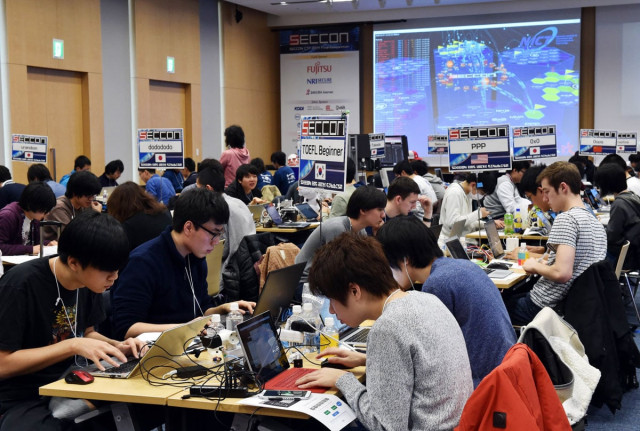 some 90 participants in 24 teams from seven nations and regions from china japan poland russia south korea taiwan and the united states compete in their hacking skills at the final rounds of the security contest 2014 seccon on february 7 2015 photo afp some 90 participants in 24 teams from seven nations and regions from china japan poland russia south korea taiwan and the united states compete in their hacking skills at the final rounds of the security contest 2014 seccon on february 7 2015 photo afp