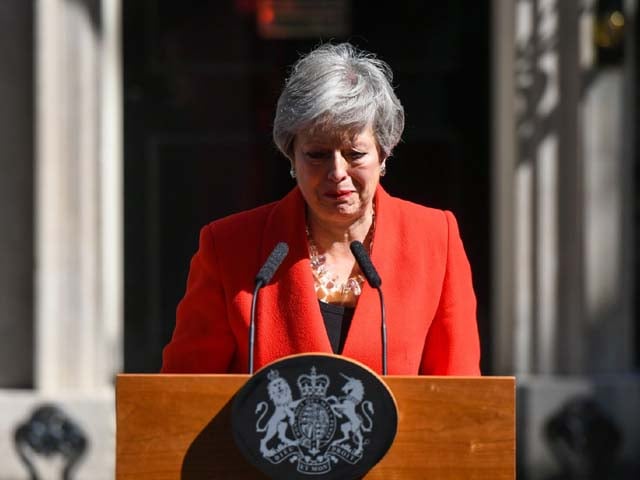 theresa may reacts as she delivers a speech announcing her resignation photo getty