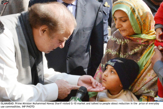 pm nawaz speaks to a child at g 10 market on sunday february 8 2015 photo inp pm nawaz speaks to a child at g 10 market on sunday february 8 2015 photo inp