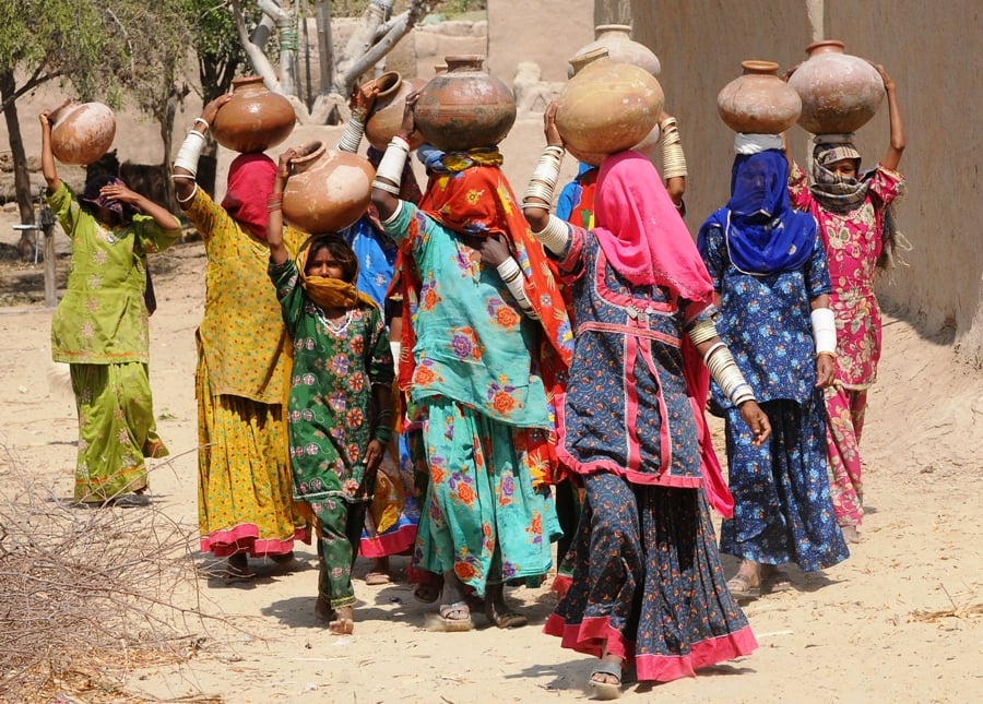 women carry water from distant areas to their households in cholistan photo mehmood qureshi express