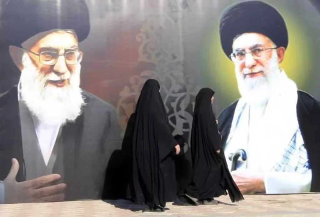 iraqi women walk past a poster depicting images of shi 039 ite iran 039 s supreme leader ayatollah ali khamenei at al firdous square in baghdad february 12 2014 photo reuters iraqi women walk past a poster depicting images of shi 039 ite iran 039 s supreme leader ayatollah ali khamenei at al firdous square in baghdad february 12 2014 photo reuters