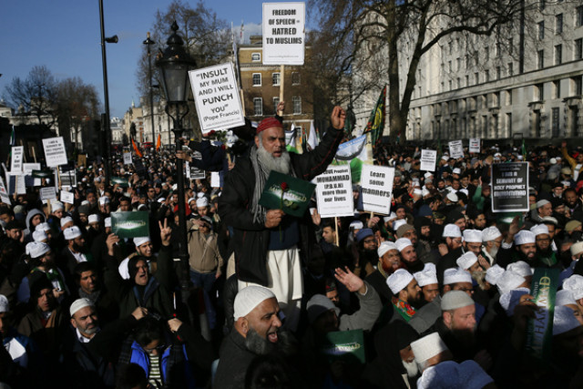 muslim demonstrators hold placards during a protest against the publication of cartoons depicting the prophet mohammad in french satirical weekly charlie hebdo near downing street in central london february 8 2015 at least 1 000 british muslims protested in central london on sunday against what they called quot insulting depictions quot of the prophet mohammad by french newspaper charlie hebdo the event comes weeks after 17 people were killed in three days of violence last month in france that began when two islamist gunmen burst into charlie hebdo 039 s paris offices opening fire in revenge for its publication of satirical images of mohammad sunday 039 s protest organisers condemned the paris attacks but said the magazine should not publish cartoons of the prophet photo reuters muslim demonstrators hold placards during a protest against the publication of cartoons depicting the prophet mohammad in french satirical weekly charlie hebdo near downing street in central london february 8 2015 at least 1 000 british muslims protested in central london on sunday against what they called quot insulting depictions quot of the prophet mohammad by french newspaper charlie hebdo the event comes weeks after 17 people were killed in three days of violence last month in france that began when two islamist gunmen burst into charlie hebdo 039 s paris offices opening fire in revenge for its publication of satirical images of mohammad sunday 039 s protest organisers condemned the paris attacks but said the magazine should not publish cartoons of the prophet photo reuters