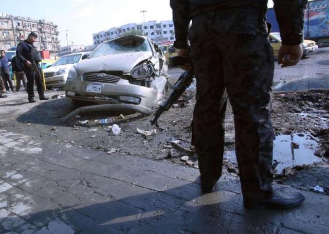 a file photo of the aftermath of a suicide bomb in baghdad photo afp