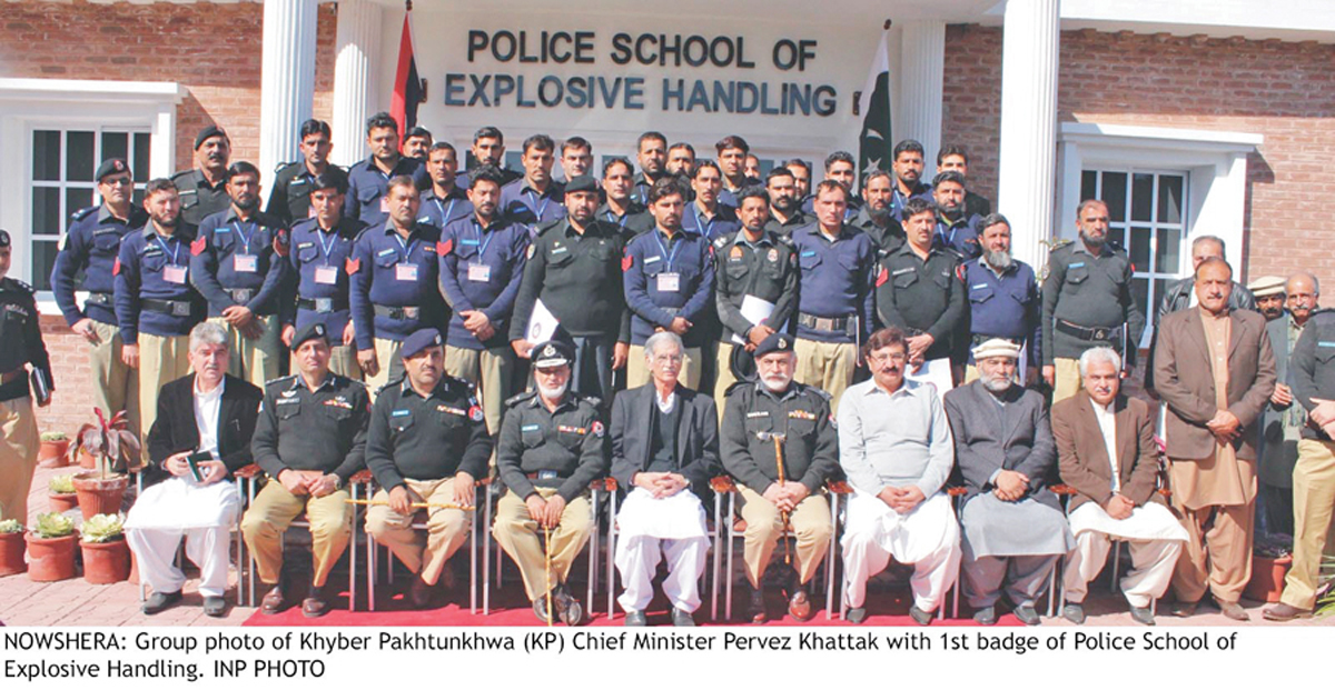 cm khattak and igp durrani with the first batch of the school photo inp