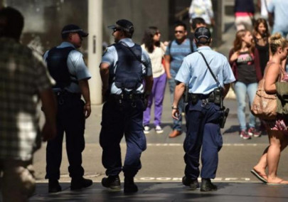 men charged as australia foils imminent terror attack