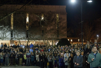 thousands turn out to keep vigil for slain muslim students in chapel hill