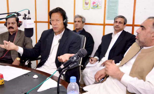 answers questions queries of callers from across the province photo courtesy k p cm press secretary answers questions queries of callers from across the province photo courtesy k p cm press secretary