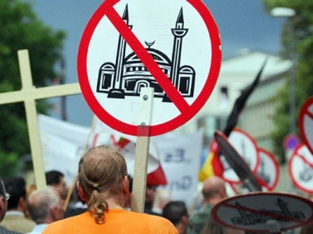 members of the pro cologne party protest the plans to build a mosque in cologne germany photo afp