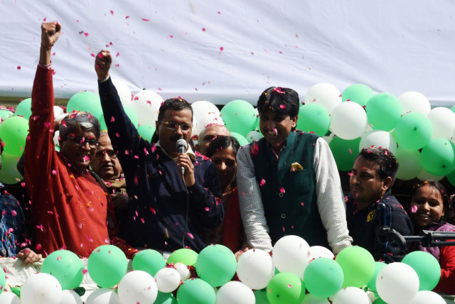 indian aam aadmi party aap leader arvind kejriwal gestures as he speaks to supporters following his victory in the state assembly elections outside the party 039 s headquarters in new delhi on february 10 2015 indian prime minister narendra modi conceded defeat on february 10 in the delhi state elections as early results showed anti corruption campaigner arvind kejriwal 039 s party set for a landslide victory photo afp indian aam aadmi party aap leader arvind kejriwal gestures as he speaks to supporters following his victory in the state assembly elections outside the party 039 s headquarters in new delhi on february 10 2015 indian prime minister narendra modi conceded defeat on february 10 in the delhi state elections as early results showed anti corruption campaigner arvind kejriwal 039 s party set for a landslide victory photo afp