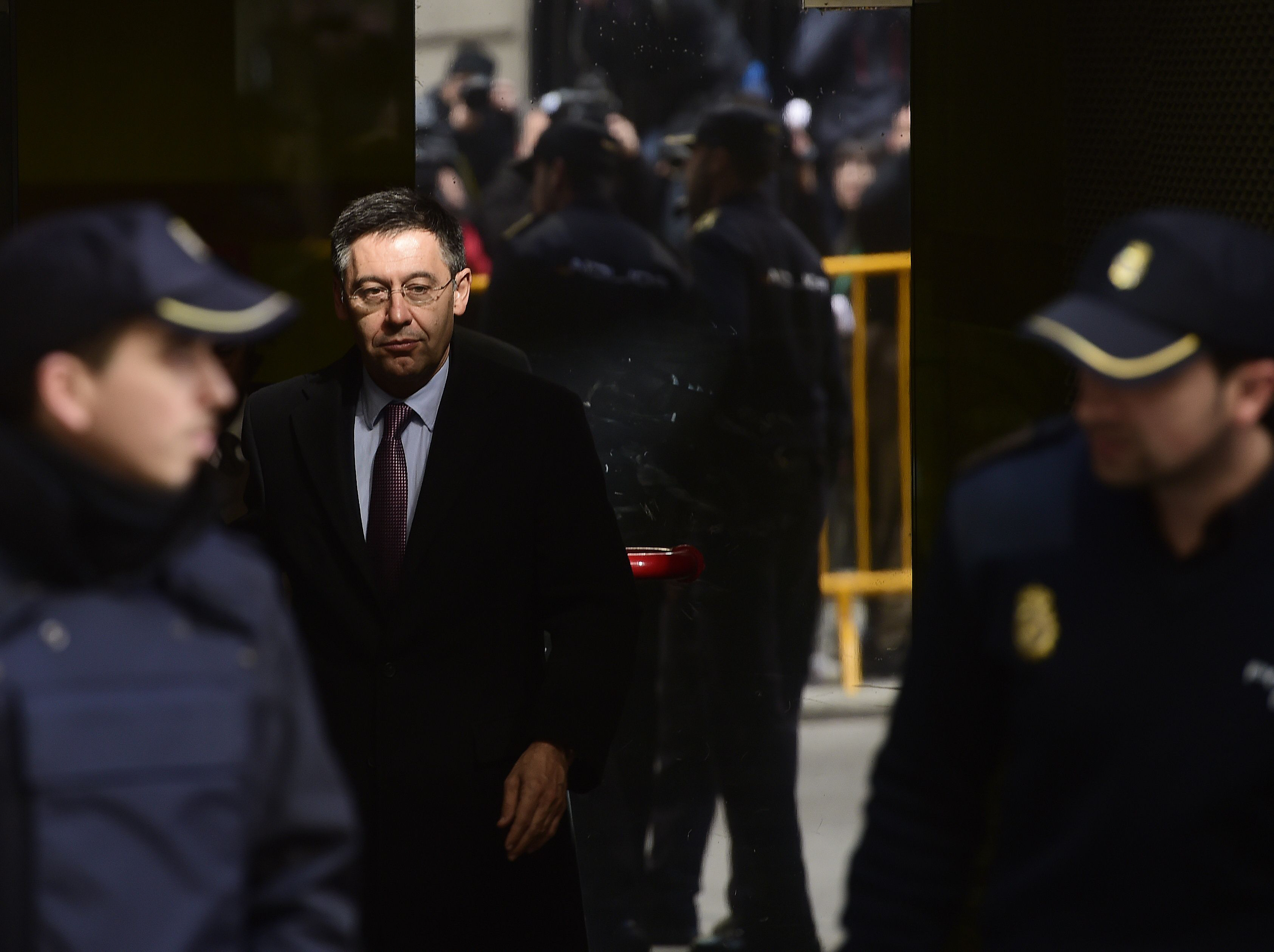president of fc barcelona spanish football club josep maria bartomeu c leaves the national high court in madrid on february 13 2015 barcelona 039 s president bartomeu was charged with tax fraud by a spanish judge on february 3 2015 suspected of evading 2 85 million euros 3 26 million in a payment made to neymar last year photo afp