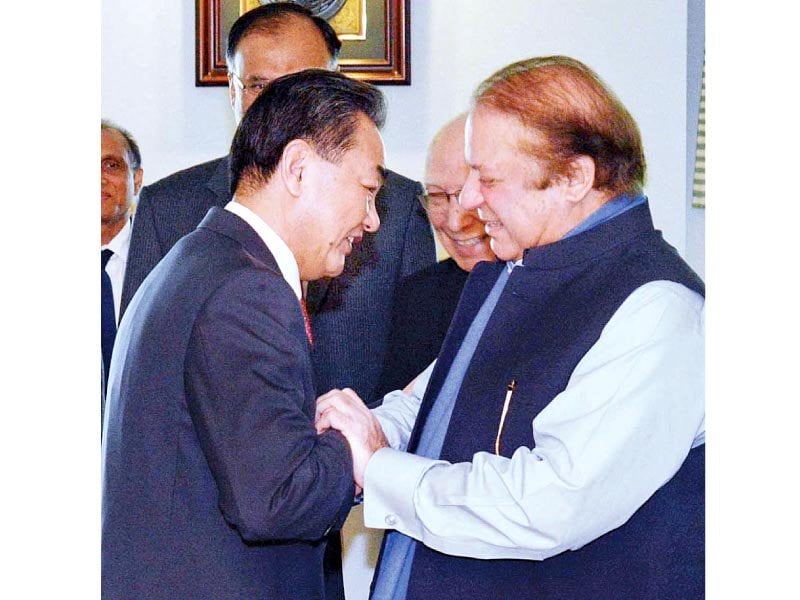 prime minister nawaz sharif greets chinese foreign minister wang yi in islamabad photo app