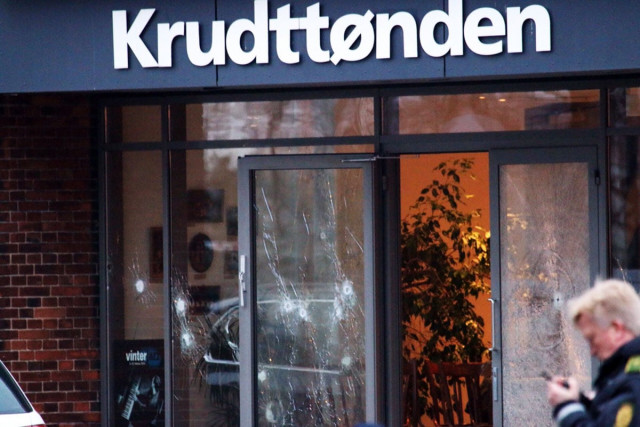 policemen secure the area around a building in copenhagen denmark where shots were fired on february 14 2015 outside the venue of a debate held on art blasphemy and free speech photo afp policemen secure the area around a building in copenhagen denmark where shots were fired on february 14 2015 outside the venue of a debate held on art blasphemy and free speech photo afp
