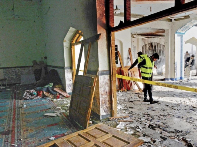 rescuers remove wreckage from imamia masjid a day after it was attacked by terrorists photo afp rescuers remove wreckage from imamia masjid a day after it was attacked by terrorists photo afp