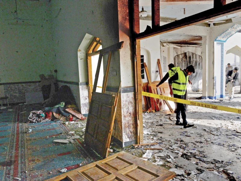 rescuers remove wreckage from imamia masjid a day after it was attacked by terrorists photo afp