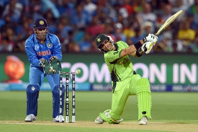 misbah ul haq r plays a shot as indian captain mahendra singh dhoni l looks on during their 2015 cricket world cup match in adelaide on february 15 2015 photo afp misbah ul haq r plays a shot as indian captain mahendra singh dhoni l looks on during their 2015 cricket world cup match in adelaide on february 15 2015 photo afp