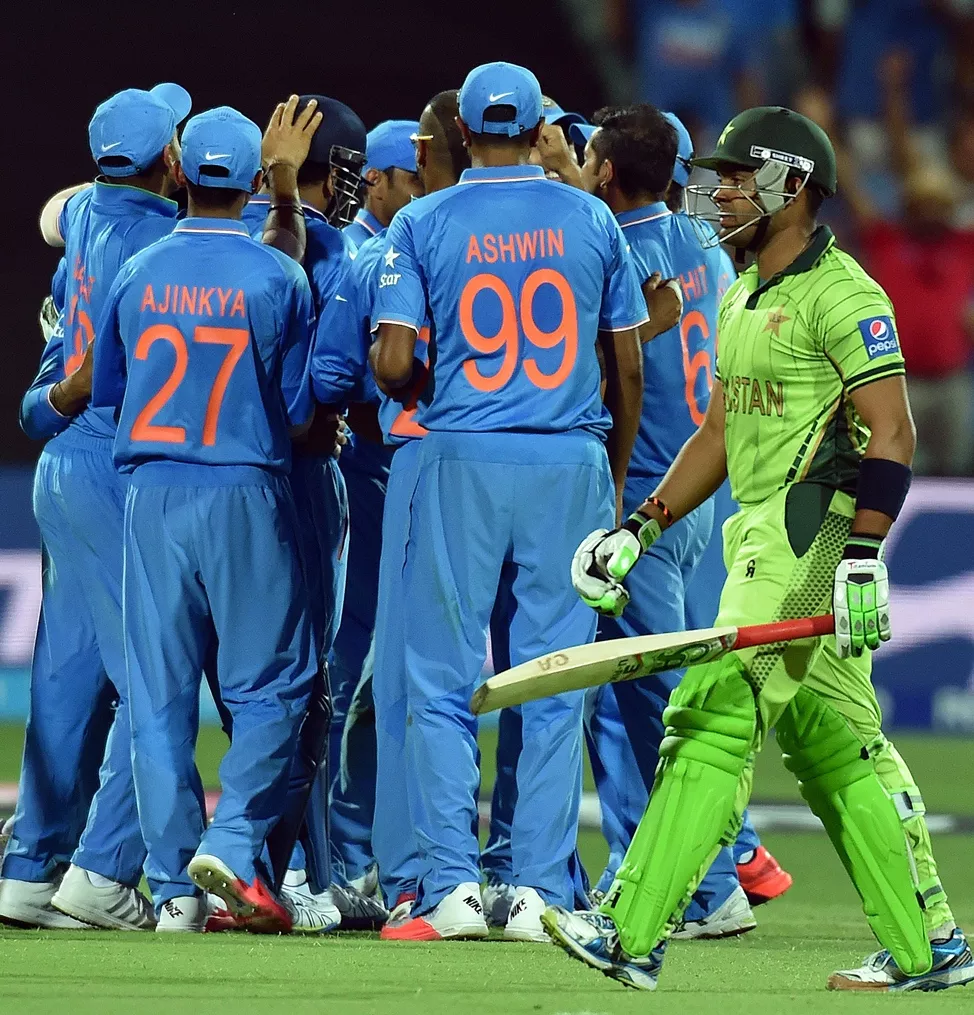 india 039 s players celebrate the dismissal of umar akmal r during the pool b 2015 cricket world cup match between india and pakistan at the adelaide oval on february 15 2015 photo afp india 039 s players celebrate the dismissal of umar akmal r during the pool b 2015 cricket world cup match between india and pakistan at the adelaide oval on february 15 2015 photo afp