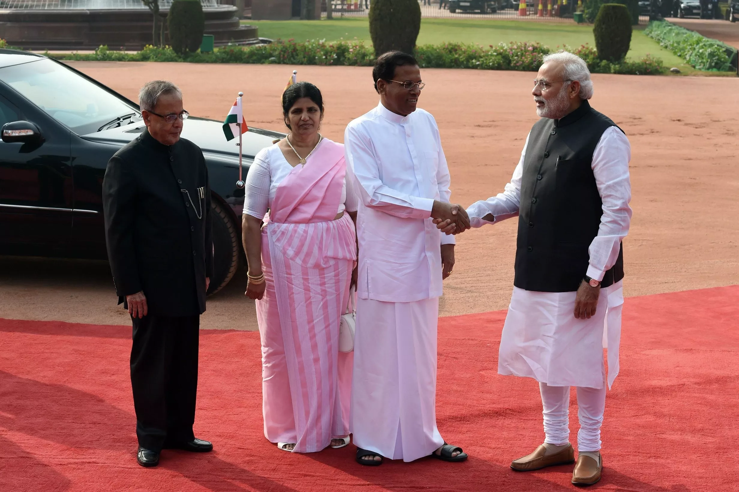 sri lankan president maithripala sirisena shakes hands with indian prime minister narendra modi as indian president pranab mukherjee and the first lady of sri lanka jayanthi pushpakumari look on during the welcome ceremony for the sri lankan dignatary at the presidential palace in new delhi on february 16 2015 photo afp sri lankan president maithripala sirisena shakes hands with indian prime minister narendra modi as indian president pranab mukherjee and the first lady of sri lanka jayanthi pushpakumari look on during the welcome ceremony for the sri lankan dignatary at the presidential palace in new delhi on february 16 2015 photo afp