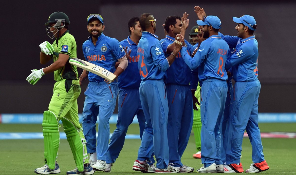 india 039 s players celebrate the dismissal of pakistan 039 s batsman younus khan l during the pool b 2015 cricket world cup match between india and pakistan at the adelaide oval on february 15 2015 photo afp