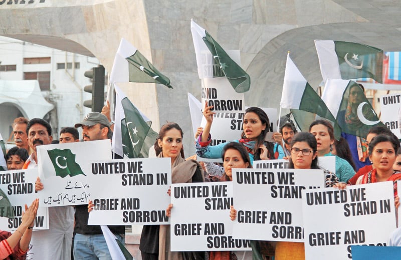 members of civil society gathered at teen talwar on monday to make sure the government does not forget the lives lost in the peshawar school attack photo aysha saleem express