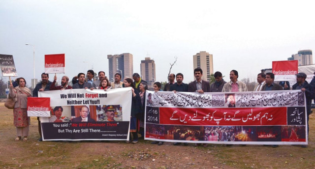 members of the civil society stand outside the press club on monday holding placards demanding that the army and government take action against perpetrators of sectarian and extremist violence in the country photo huma choudhary express members of the civil society stand outside the press club on monday holding placards demanding that the army and government take action against perpetrators of sectarian and extremist violence in the country photo huma choudhary express