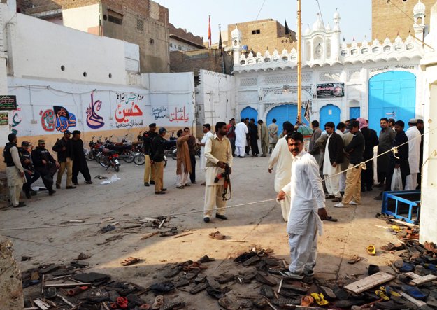 at least 61 people were killed and 50 others injured in an explosion at an imambargah in shikarpur on friday photo afp