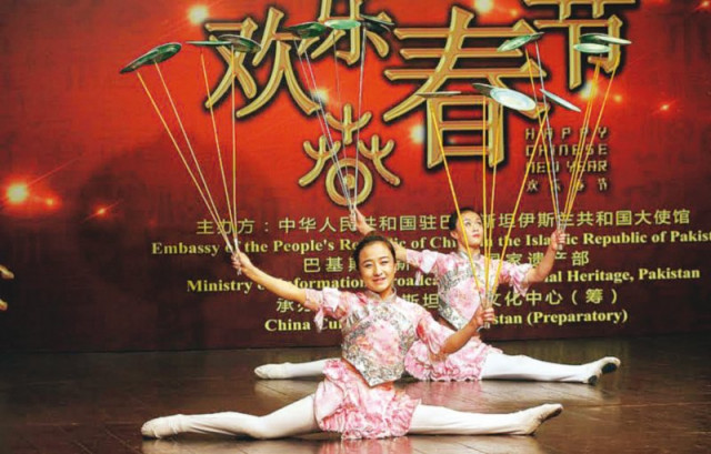the performers traditional costumes embellished with motifs and prints represented different parts of china photo publicity the performers traditional costumes embellished with motifs and prints represented different parts of china photo publicity